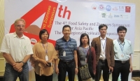 FBLI Coordinator Nguyen Viet Hung (third from left) and researcher Dang Xuan Sinh of CENPHER (second from right) pose for a photo on the sidelines of the conference. Photo credit: Duong Van Nhiem